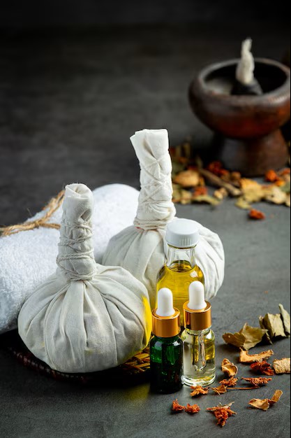 https://swasthyaholistic.in/wp-content/uploads/2024/07/herbal-compress-herbal-spa-treatment-equipments-put-dark-floor_1150-34499.jpg